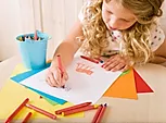 young girl coloring